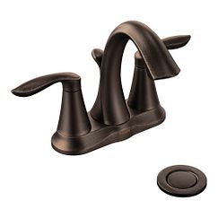 Llave de dos manerales con acabado en bronce aceitado y arco alto para baño